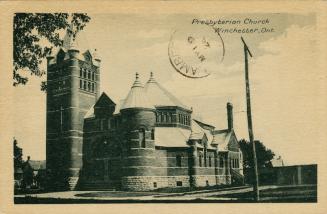 Black and white photograph of a Romanesque style church.