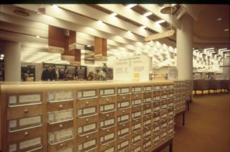 Picture of a row of large wooden card catalogues.