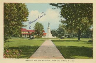 Colorized photograph of a path in a well groomed city park which leads up to a statue on a pede…