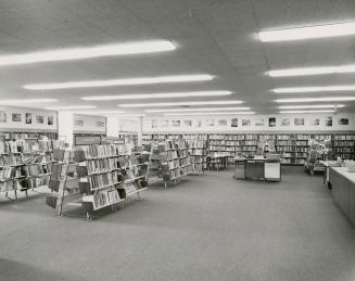 Picture of a library interior showing shelves of books. 