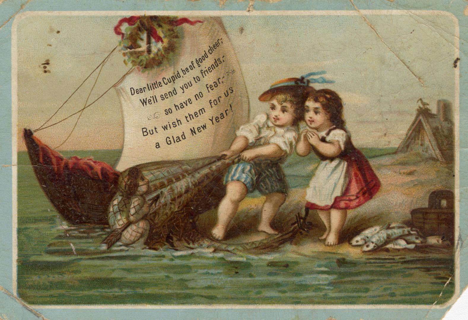 A girl and boy stand at the edge of the water on a beach. The boy is pulling a fishing net out …