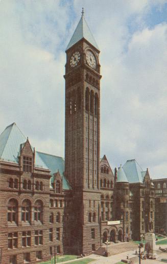 Color photograph of a large Richardsonian Romanesque, commercial building.