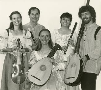 Plain background. A group of musicians with their medieval instruments. lutes, wooden flutes an…