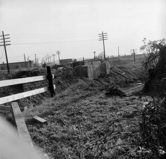 Photograph of construction of bridge over railway line. 