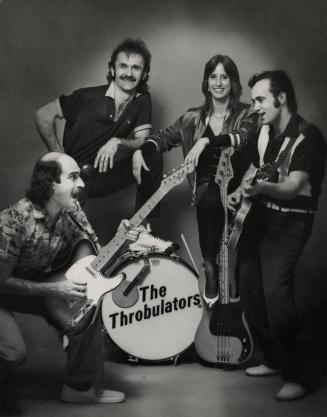 3 men and 1 woman with instruments