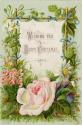 The centre of the card contains the text "Wishing you a Happy Christmas". This is framed by lea…