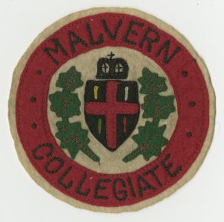 A colourful felt (fabric) patch for Malvern Collegiate.