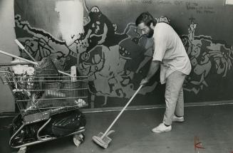 Tony Rodriguez mops up Rochdale hall. 