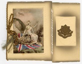 The front of the card pictures a lion and a woman sitting on a British flag. The woman is weari…