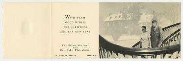 Photograph of John and Olive Diefenbaker descending a staircase; a faint photo of the exterior …