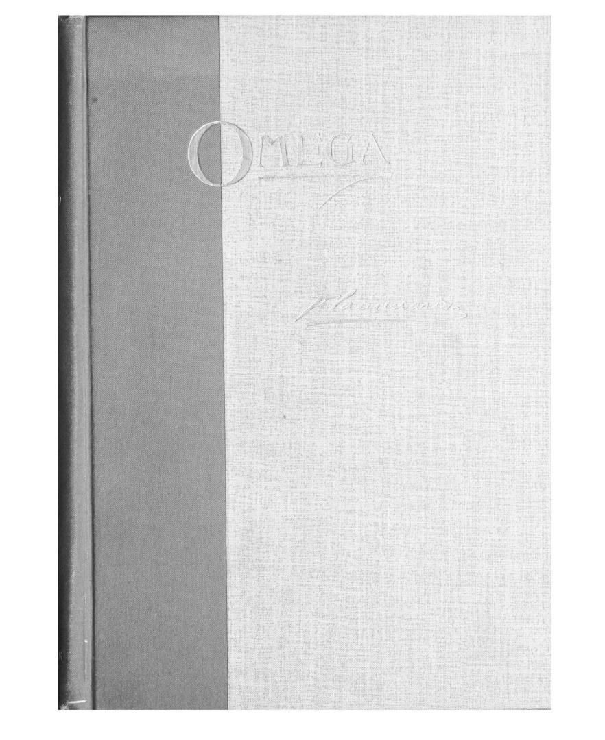 Black and white image of a book with a dark spine and light cover.