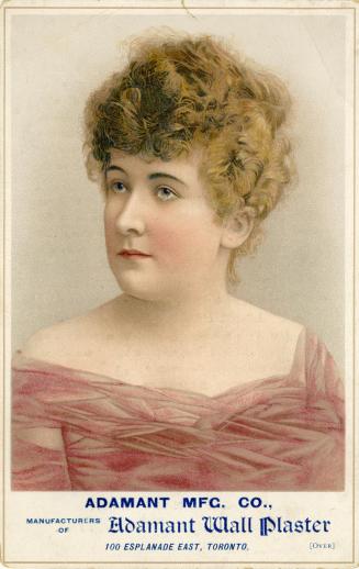 Portrait of a woman with curly brown hair with her head turned to one side. She is wearing a pi ...