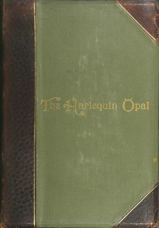 Green and brown leather-bound book. Title on front in gold text. 
