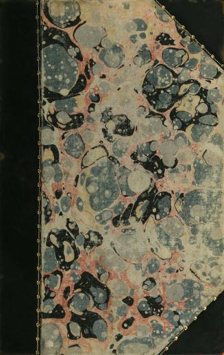 Cover has marbled paper design with leather bound spine and corners. No text or illustration