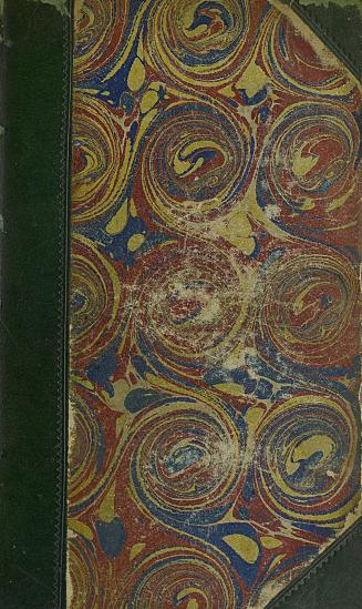 Marbled book cover with green leather spine