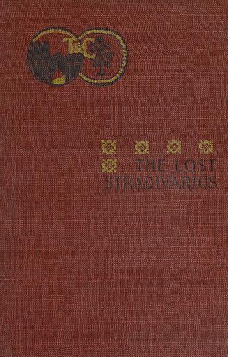 Book cover; red cloth. Two overlapping circles in left corner, one with a black castle wall, on ...