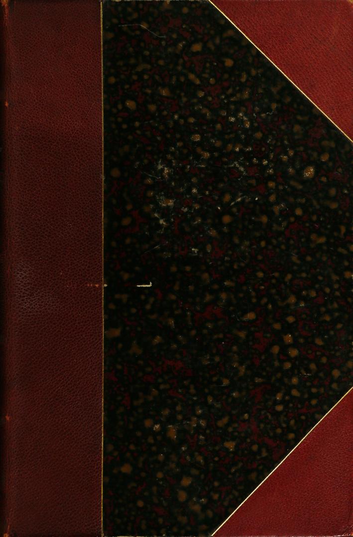 No text or illustration on cover. Item is bound in red leather with marbled design in centre.