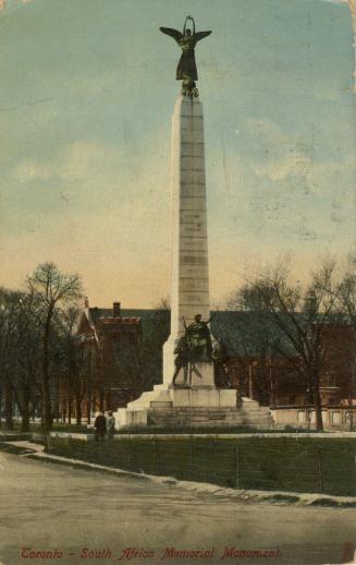 Picture of wide street with large monument. 