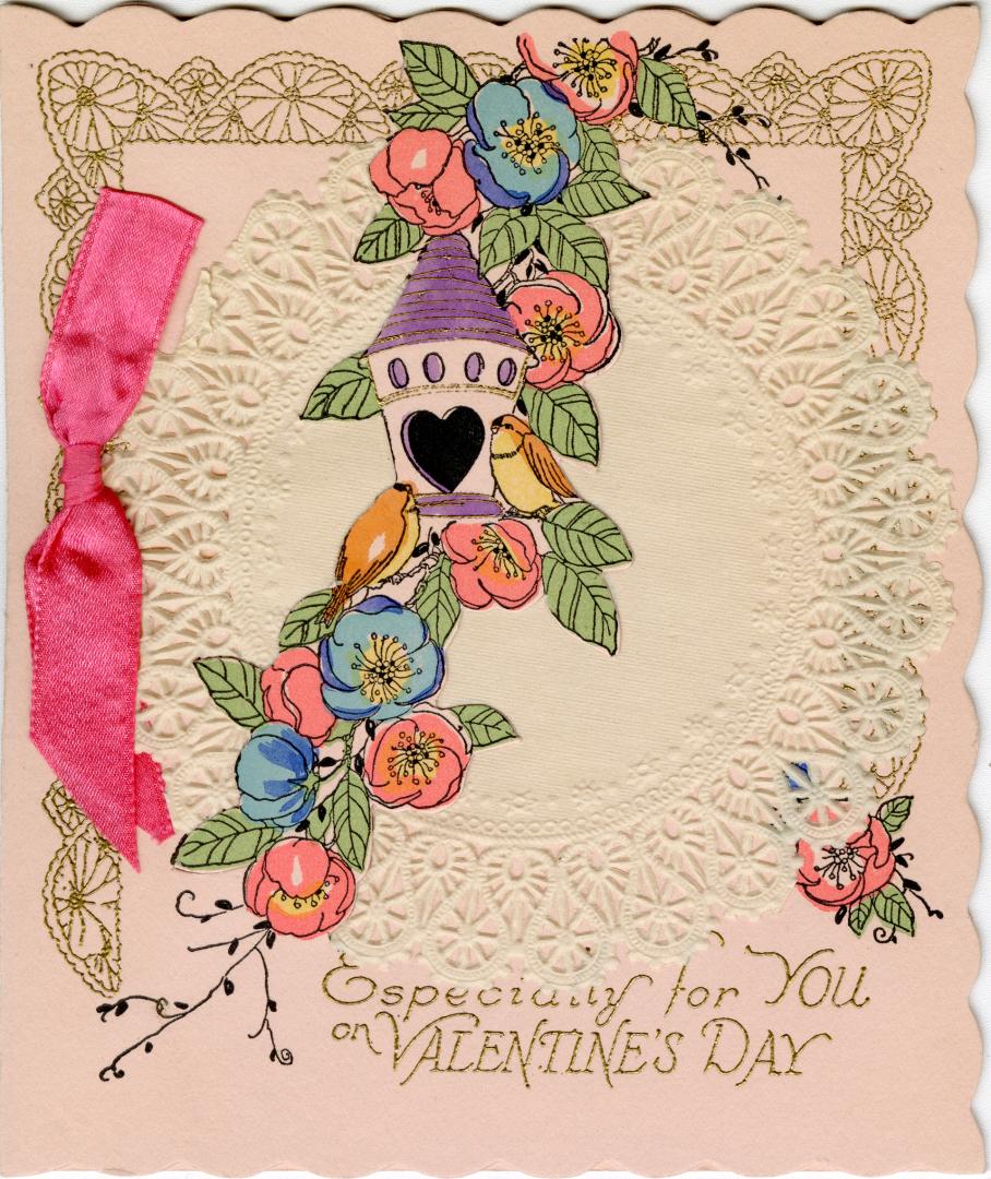At the centre of this folded lace card is a flowering branch that holds a purple bird feeder. T ...
