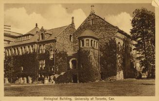 Sepia toned photograph of a large, stone collegiate building.