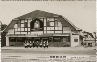 Black and White photo postcard depicting a restaurant-motel, with caption at the bottom of the  ...