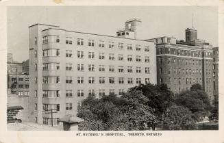 Black and white photograph of a multi-story public building.