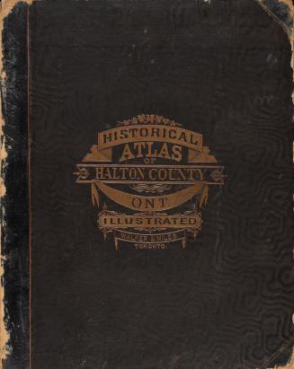 Atlas with brown leather cover with embossed gold lettering 