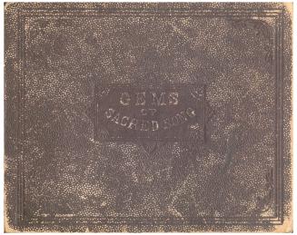 A leather bound book, dark brown with floral ornaments on the cover.A leather bound book, dark  ...