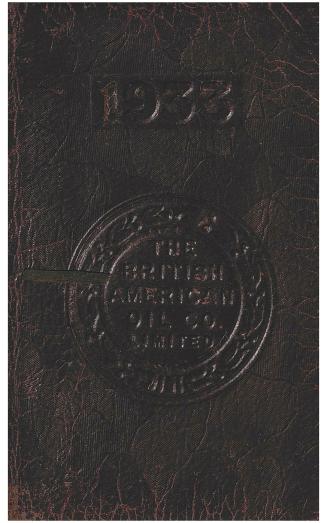 A pocket-sized, leather-wrapped agenda book containing a calendar and address book. The front c ...